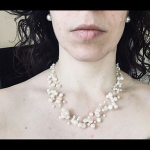 Multi-strand floating pearl necklace